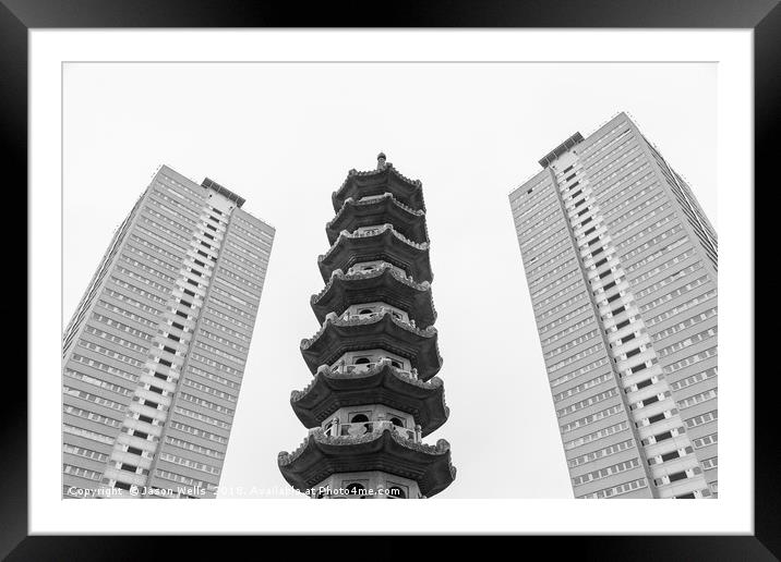 Chinese pagoda between two old blocks of flats Framed Mounted Print by Jason Wells