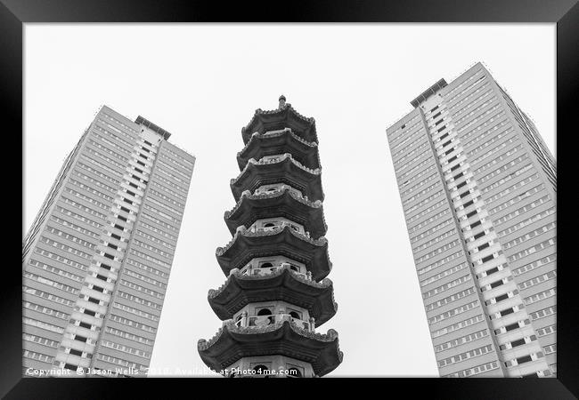 Chinese pagoda between two old blocks of flats Framed Print by Jason Wells