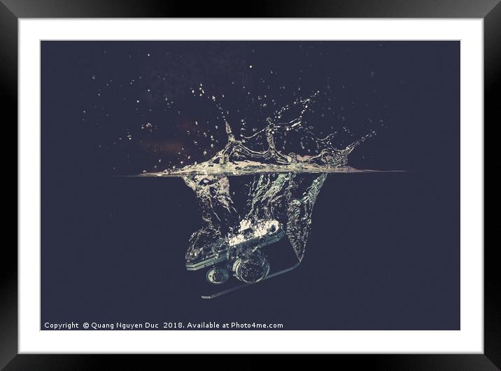 Camera drops into water with splash Framed Mounted Print by Quang Nguyen Duc
