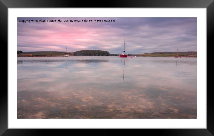 sunrise over a lake Framed Mounted Print by Alan Tunnicliffe