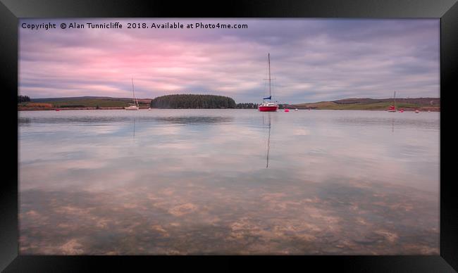 sunrise over a lake Framed Print by Alan Tunnicliffe