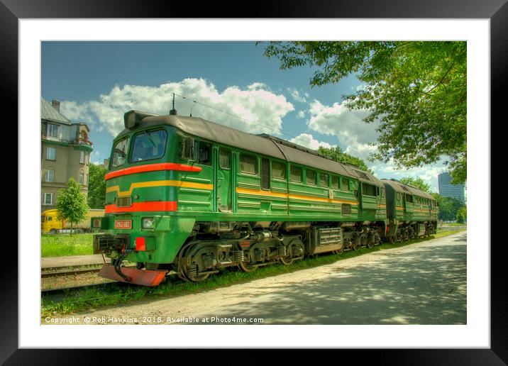 Latvian Loco double  Framed Mounted Print by Rob Hawkins