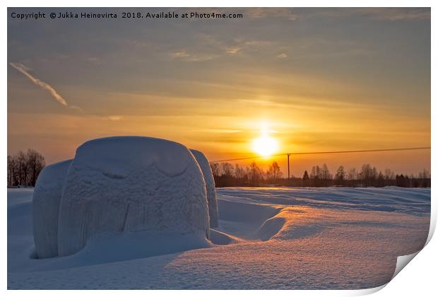 Plastic Wrapped Hay Rolls Covered With Snow Print by Jukka Heinovirta