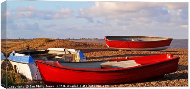 Red Fishing Boats On Dunwich Beach Suffolk Canvas Print by Ian Philip Jones