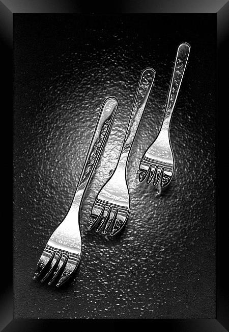Funky forks Framed Print by Graham Piper