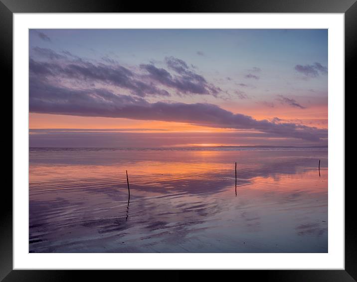 Sunset and the Sticks on Pendine Beach. Framed Mounted Print by Colin Allen