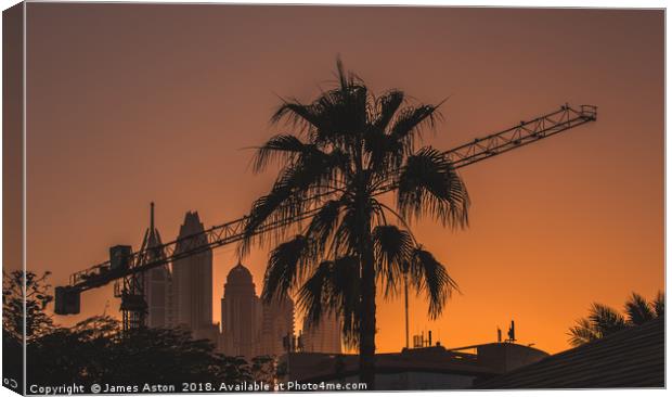 Sunset over the Internet City Dubai Canvas Print by James Aston