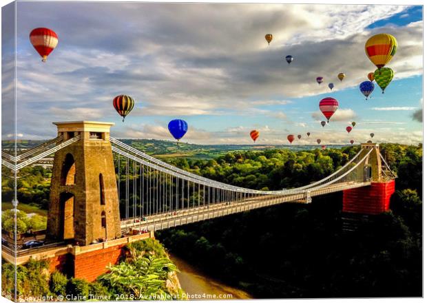 Hot air balloons over Clifton suspension bridge Canvas Print by Claire Turner