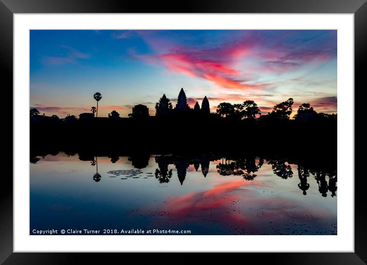 Pink sunrise at Angkor Wat Framed Mounted Print by Claire Turner