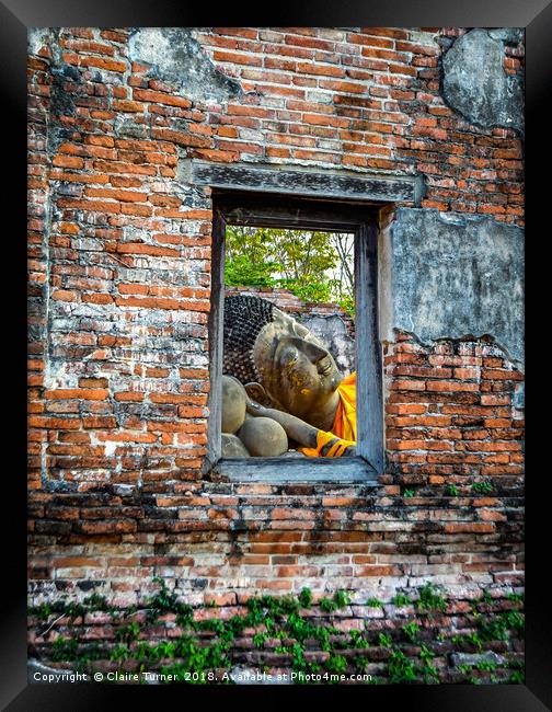 Window to buddha Framed Print by Claire Turner