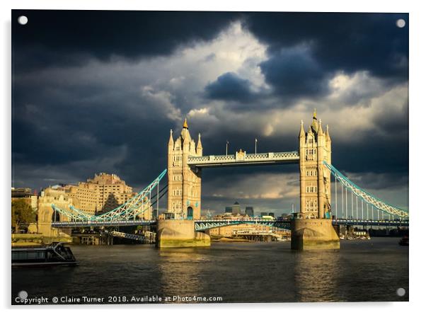Tower bridge illuminated in a dark sky Acrylic by Claire Turner