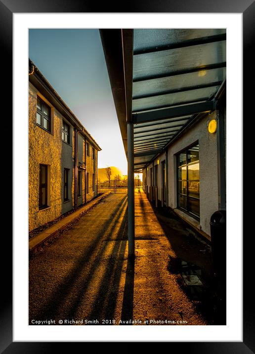 Early morning sunlight streams down a passage way. Framed Mounted Print by Richard Smith