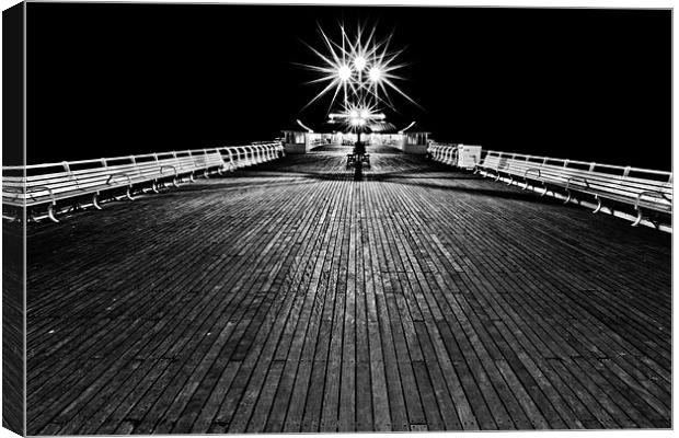 'Pier'ing into the distance Mono Canvas Print by Paul Macro
