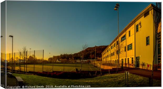 The all weather pitches at Portree High School. Canvas Print by Richard Smith