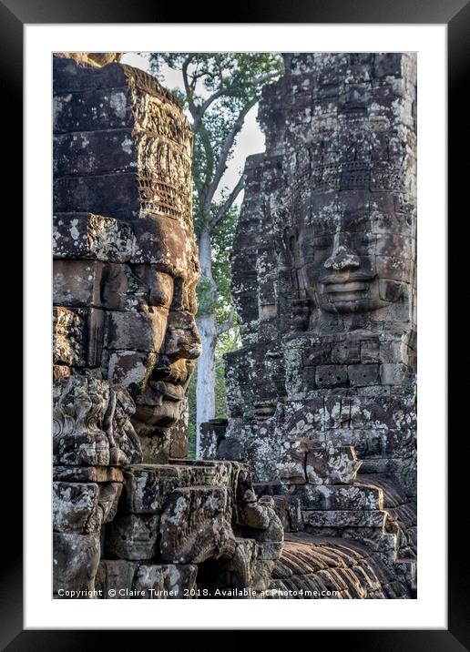 Faces of Bayon Framed Mounted Print by Claire Turner