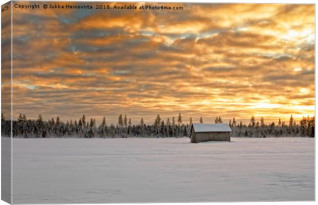 Small Barn House Covered With Snow Under the Drama Canvas Print by Jukka Heinovirta