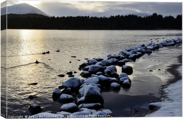 Loch Morlich winter snow Canvas Print by Angus McComiskey