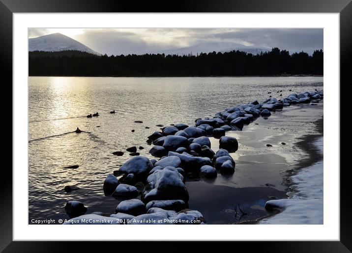 Loch Morlich winter snow Framed Mounted Print by Angus McComiskey