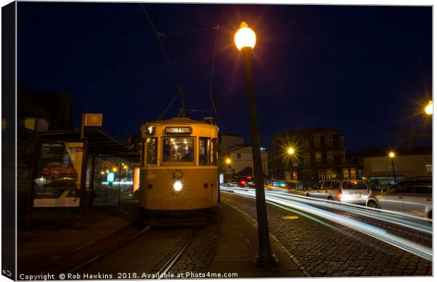 Porto Night Tram  Canvas Print by Rob Hawkins