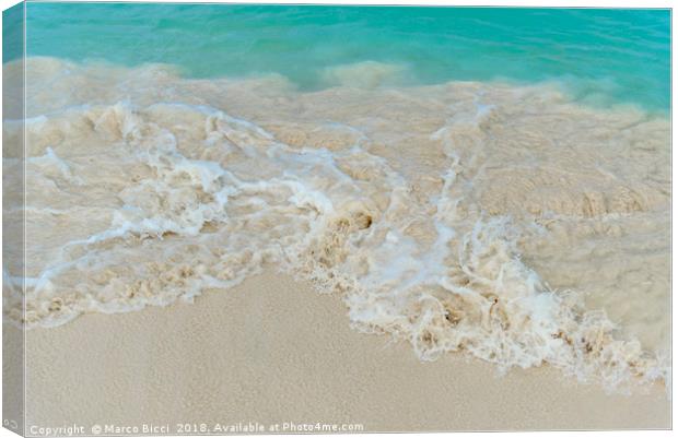 Shiny tropic sea wave on golden beach sand in Arub Canvas Print by Marco Bicci