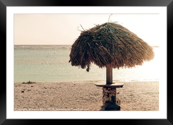 A parasol in the idyllic Baby Beach, Aruba Framed Mounted Print by Marco Bicci