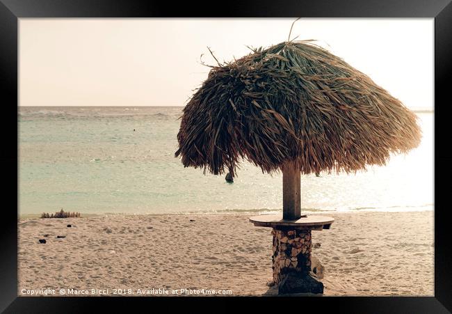 A parasol in the idyllic Baby Beach, Aruba Framed Print by Marco Bicci