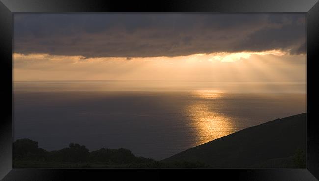 Exmoor coast at sunset Framed Print by Ian Middleton