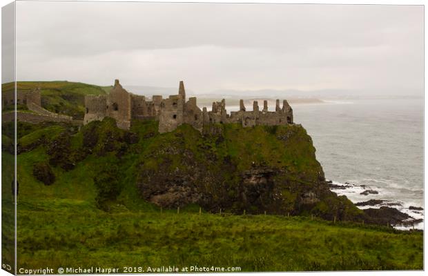 The Ruins of the ancient Dunluce Castle  Canvas Print by Michael Harper