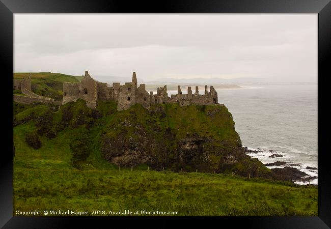 The Ruins of the ancient Dunluce Castle  Framed Print by Michael Harper