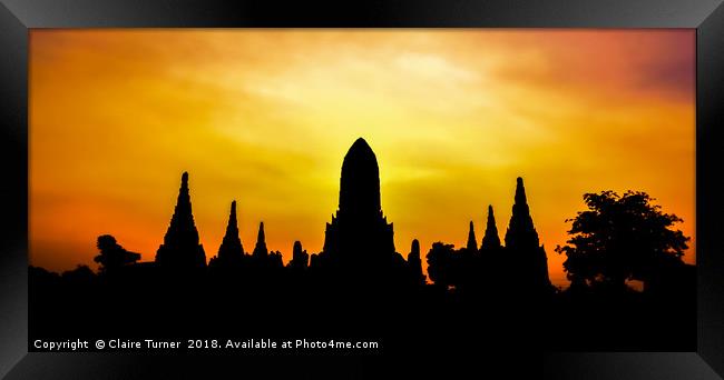 Ayutthuya sunset Framed Print by Claire Turner