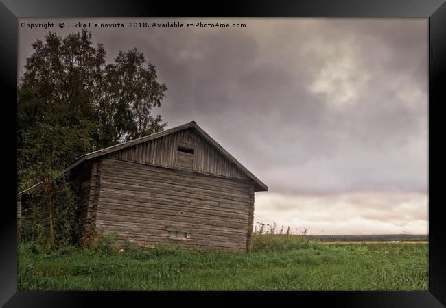 Dramatic Clouds Over The Barn House Framed Print by Jukka Heinovirta