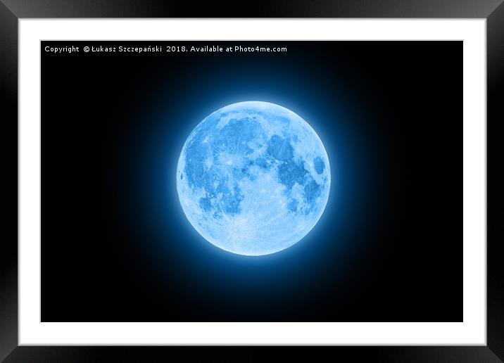 Blue super moon glowing with blue halo isolated on Framed Mounted Print by Łukasz Szczepański
