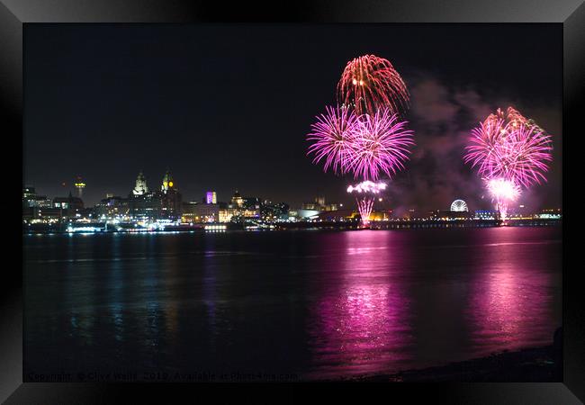 Fireworks over Liverpool waterfront Framed Print by Clive Wells