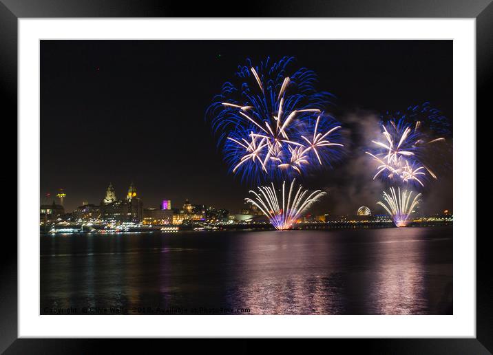 Bright lights over the riverfront at Liverpool Framed Mounted Print by Clive Wells