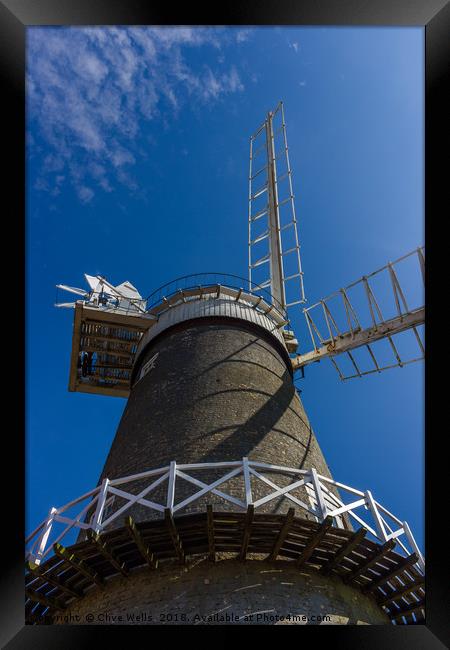 Bircham Windmill under blue Norfolk skies Framed Print by Clive Wells