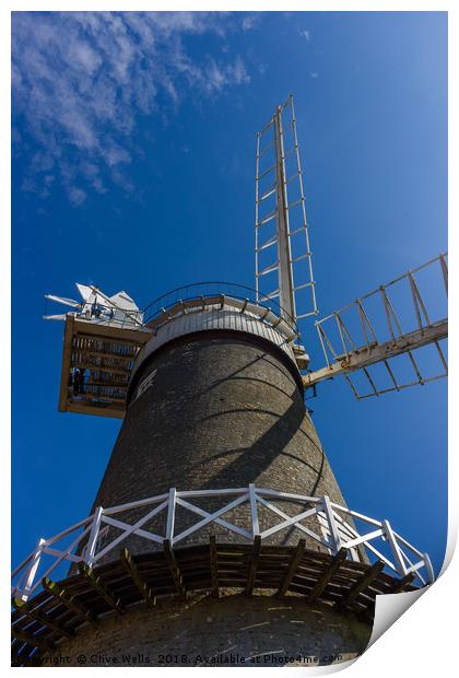 Bircham Windmill under blue Norfolk skies Print by Clive Wells