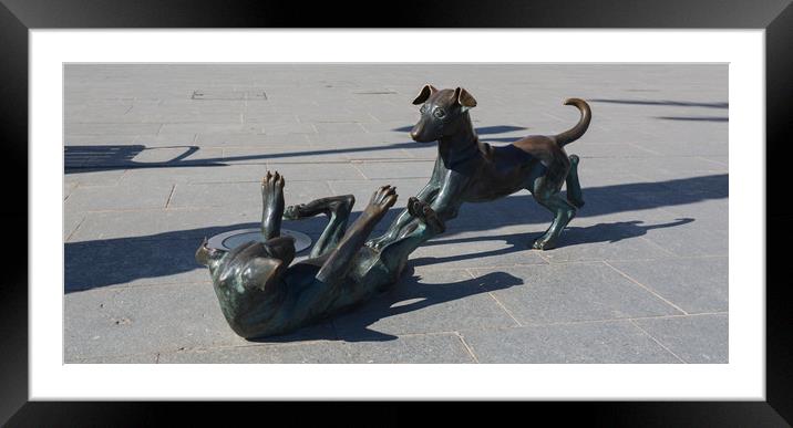 bronze dogs santa eulalia, ibiza Framed Mounted Print by kevin murch