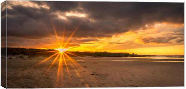 Sunburst and Bamburgh Beach Canvas Print by Naylor's Photography