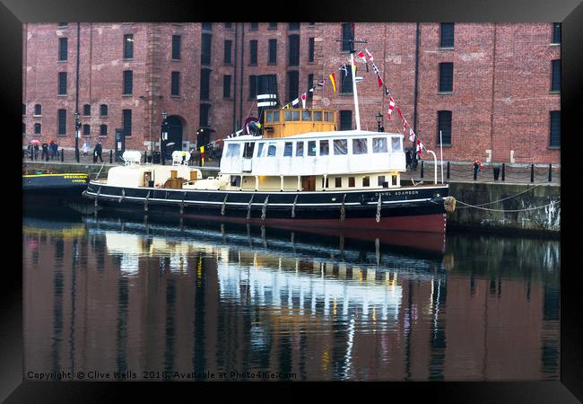 Pleasure boat in Albert Dock, Liverpool Framed Print by Clive Wells