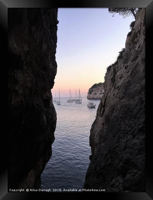 Boats at Sunset, Cala Galdana, Menorca Framed Print by Ailsa Darragh