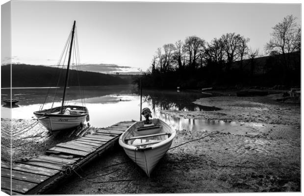 Saint Clement moorings at low tide in monochrome Canvas Print by Michael Brookes