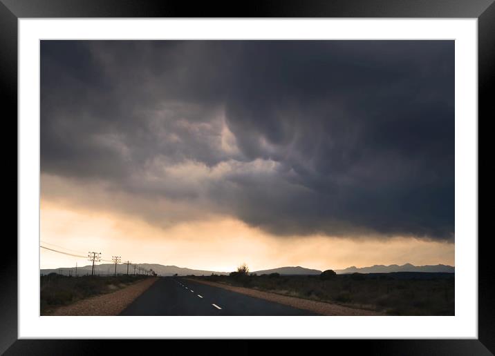 Road trip with stormy sky Framed Mounted Print by Sue Hoppe
