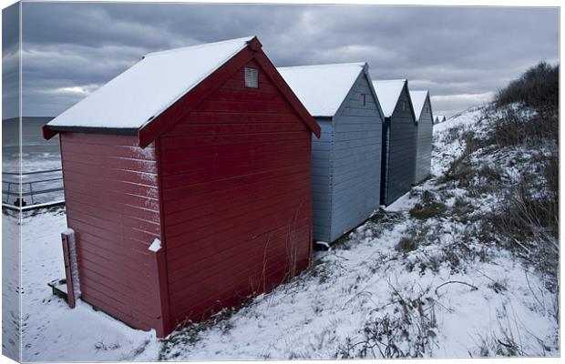 Winter Beach Huts Canvas Print by Paul Macro