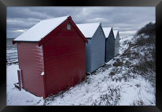 Winter Beach Huts Framed Print by Paul Macro