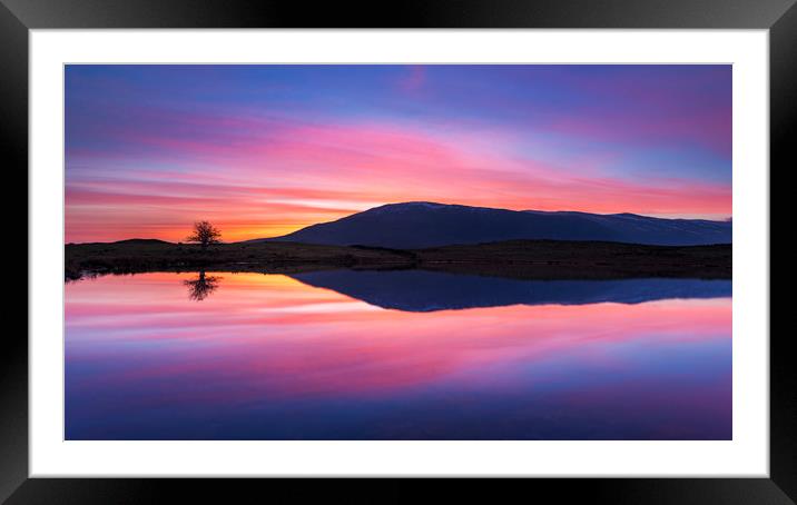 Tewet Tarn sunrise. Lake District Framed Mounted Print by John Finney