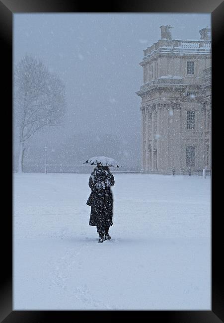 Walking in The Snow Framed Print by Karen Martin