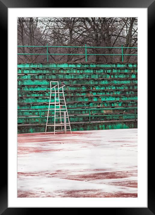 Crow On A Snowy Tennis Court Framed Mounted Print by Jukka Heinovirta