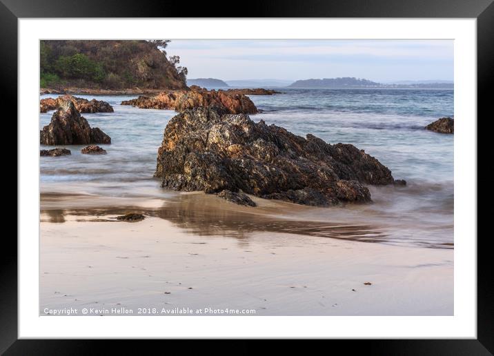 Rocks in the sea Framed Mounted Print by Kevin Hellon