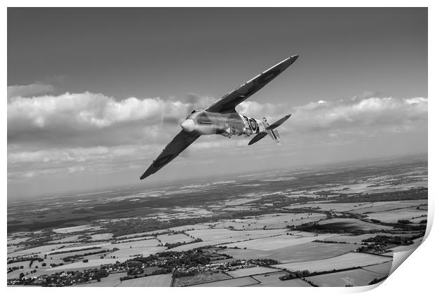 Spitfire TR 9 on a roll, B&W version Print by Gary Eason