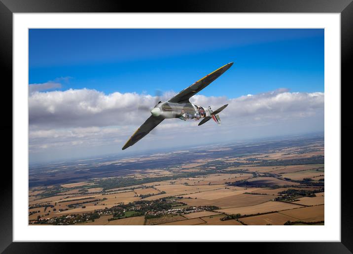 Spitfire TR 9 on a roll Framed Mounted Print by Gary Eason